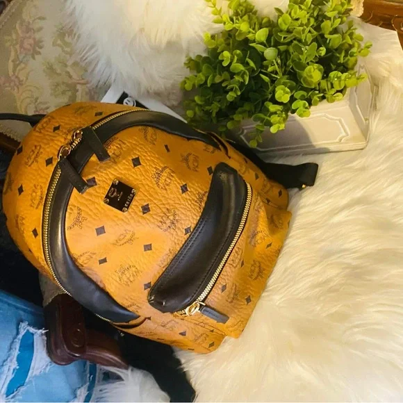 MCM | Bags | Mcm Tan And Black Logo Backpack | Poshmark display picture 2